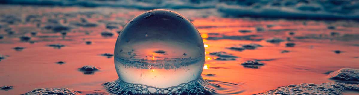 Glass ball at the sea